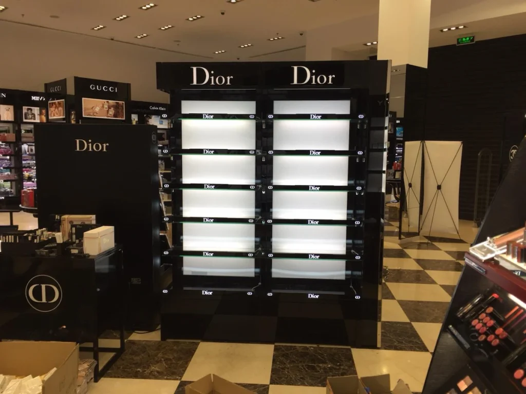 Custom retail display for Dior, produced and installed in a DFW beauty store